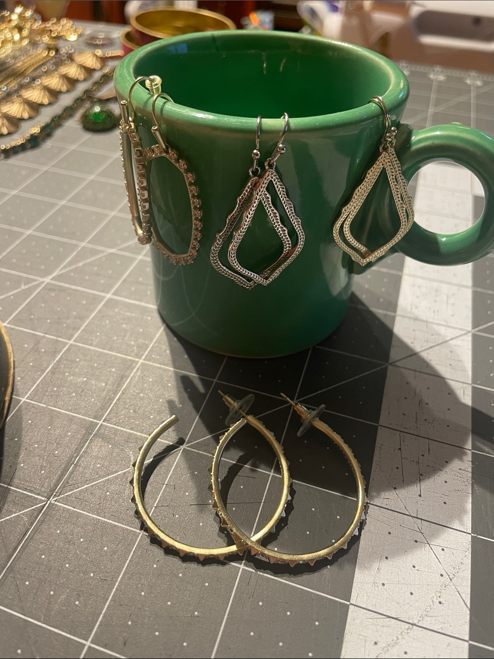 Four pairs of Kendra Scott earrings